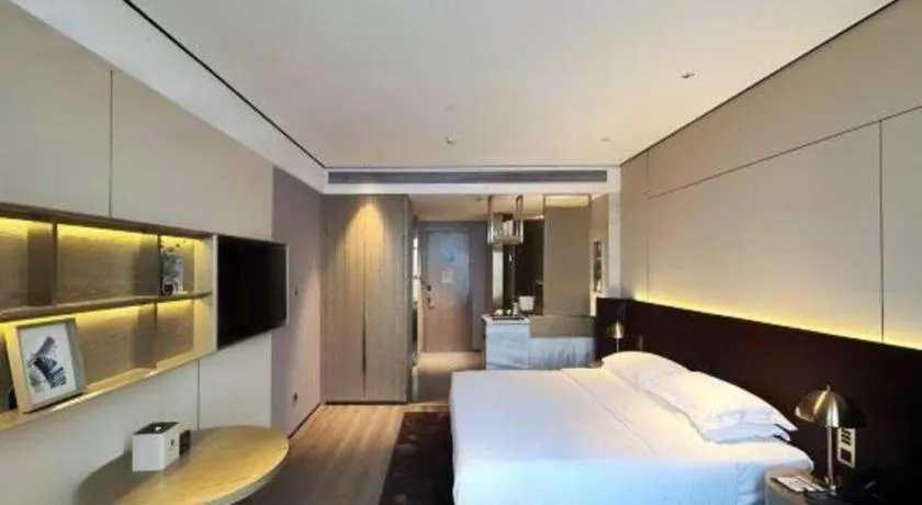 Bed in Echarm Plus Hotel Changsha High-speed Railway South Station Desiqin