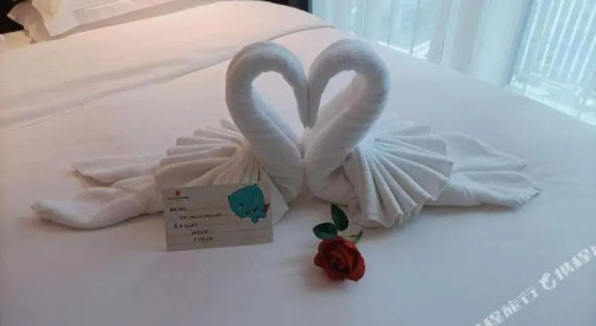 Bed in Echarm Plus Hotel Changsha High-speed Railway South Station Desiqin