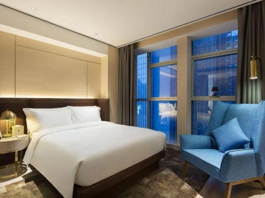 Bed in Echarm Plus Hotel Changsha High-speed Railway South Station Desiqin
