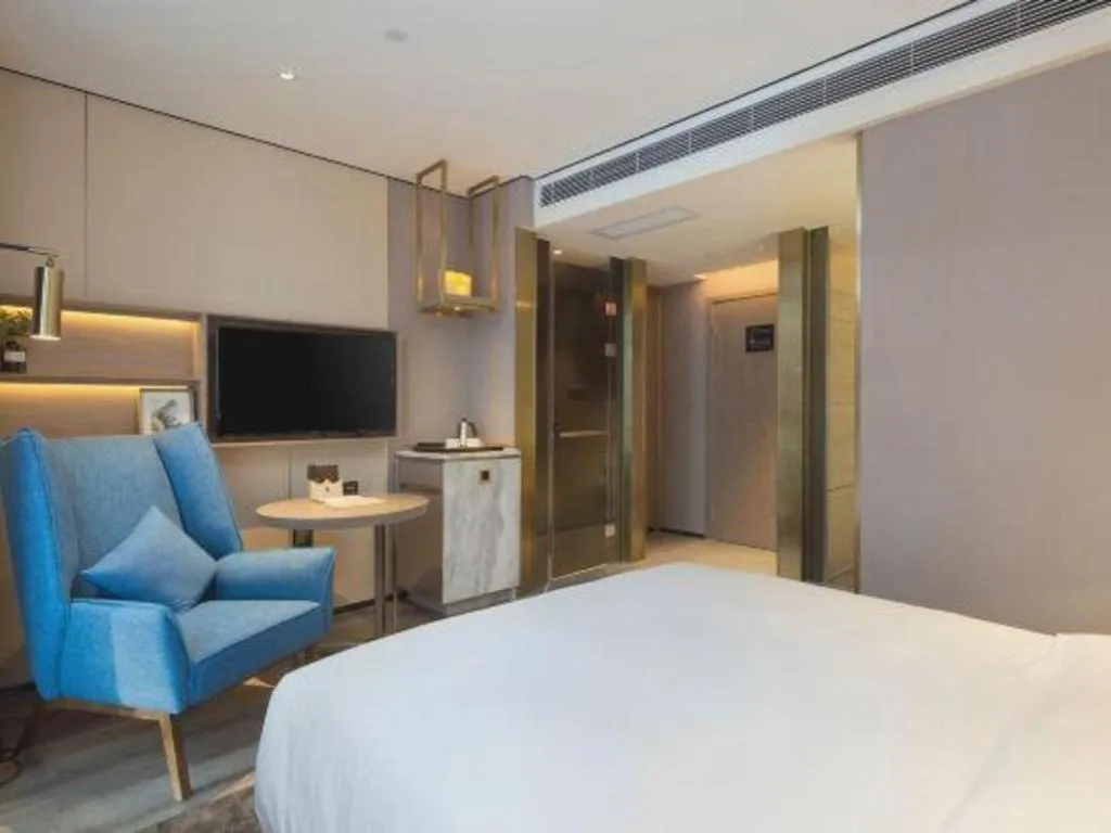 Bed in Echarm Plus Hotel Changsha High-speed Railway South Station Desiqin