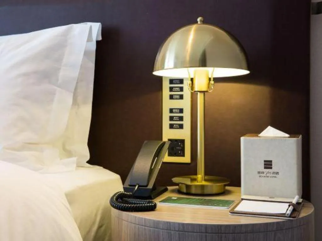 Bed in Echarm Plus Hotel Changsha High-speed Railway South Station Desiqin