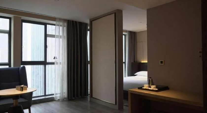 Bed in Echarm Plus Hotel Changsha High-speed Railway South Station Desiqin