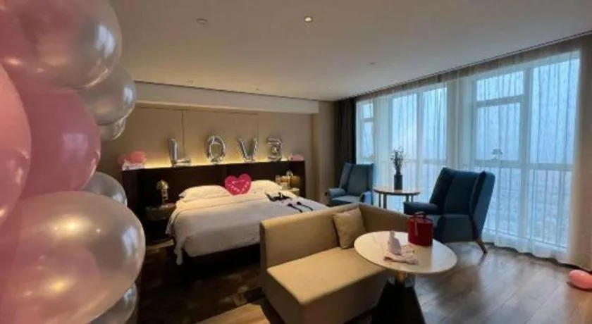 Bed in Echarm Plus Hotel Changsha High-speed Railway South Station Desiqin