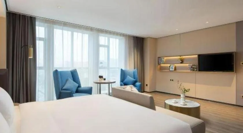 Bed in Echarm Plus Hotel Changsha High-speed Railway South Station Desiqin