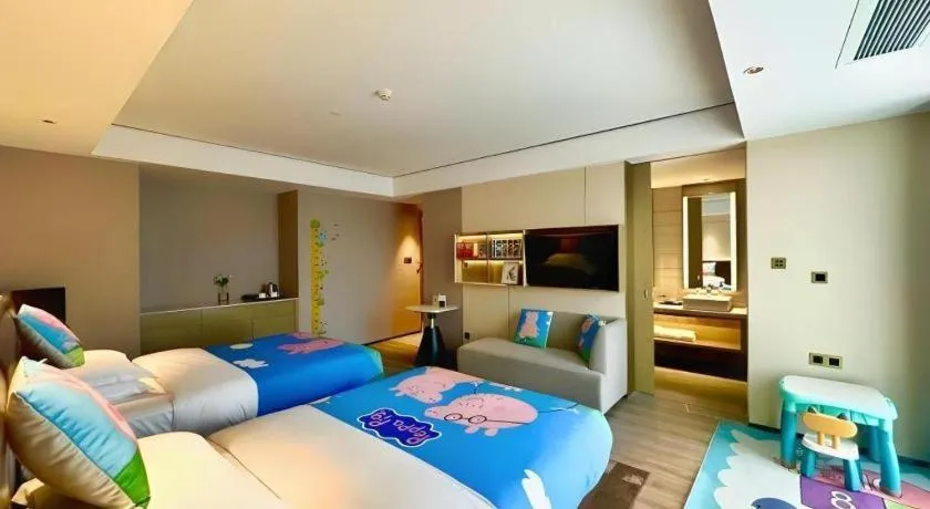 Bed in Echarm Plus Hotel Changsha High-speed Railway South Station Desiqin
