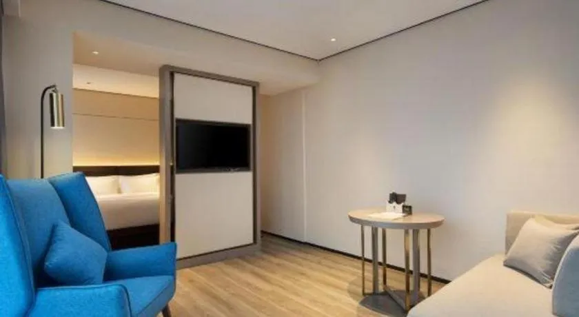 Bed in Echarm Plus Hotel Changsha High-speed Railway South Station Desiqin