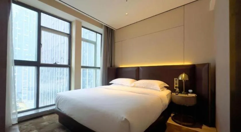Bed in Echarm Plus Hotel Changsha High-speed Railway South Station Desiqin