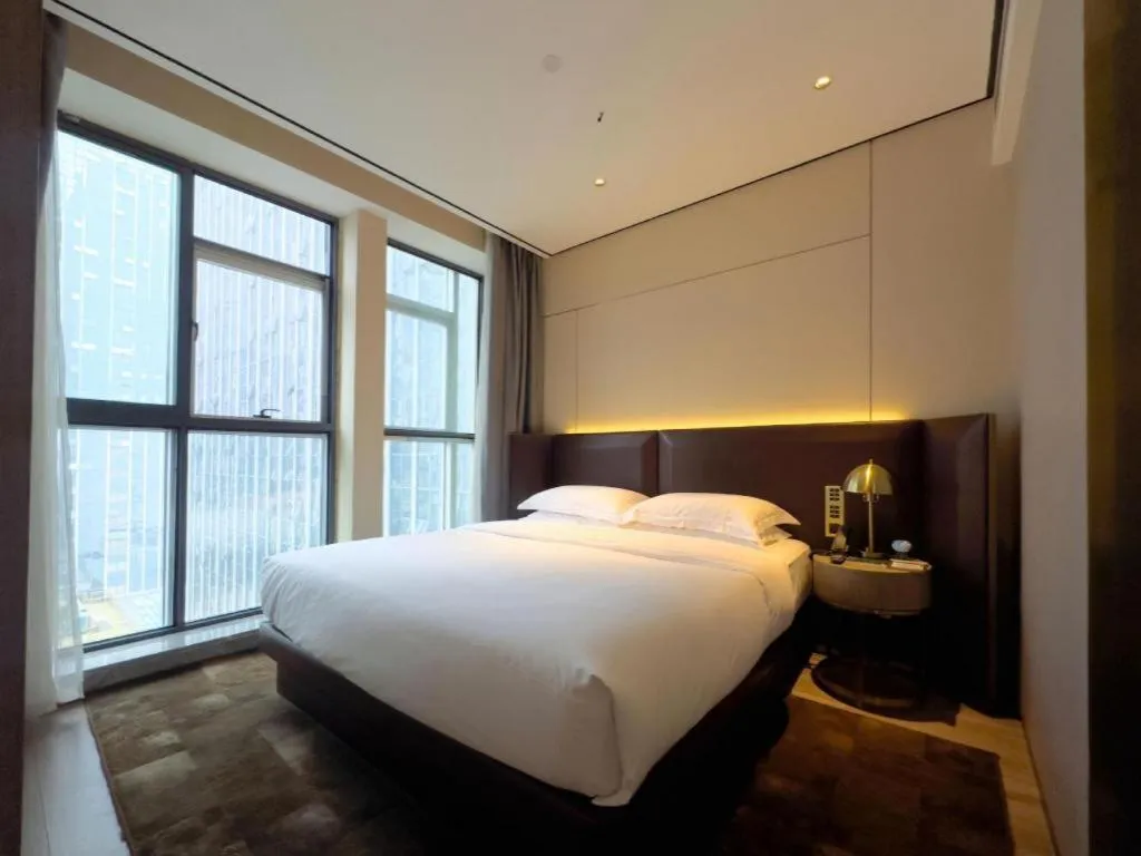 Bed in Echarm Plus Hotel Changsha High-speed Railway South Station Desiqin