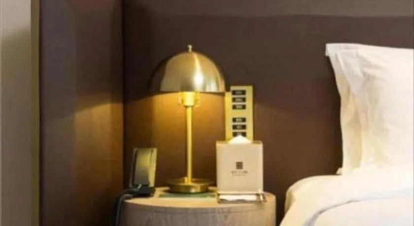 Bed in Echarm Plus Hotel Changsha High-speed Railway South Station Desiqin