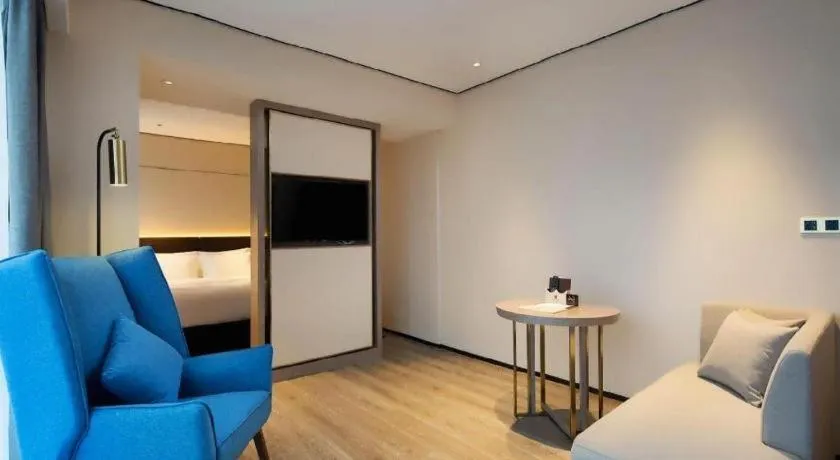 Bed in Echarm Plus Hotel Changsha High-speed Railway South Station Desiqin