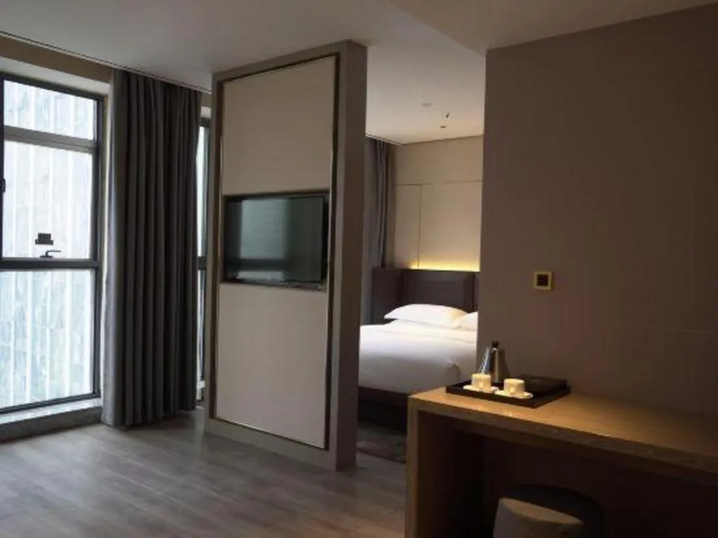 Bed in Echarm Plus Hotel Changsha High-speed Railway South Station Desiqin