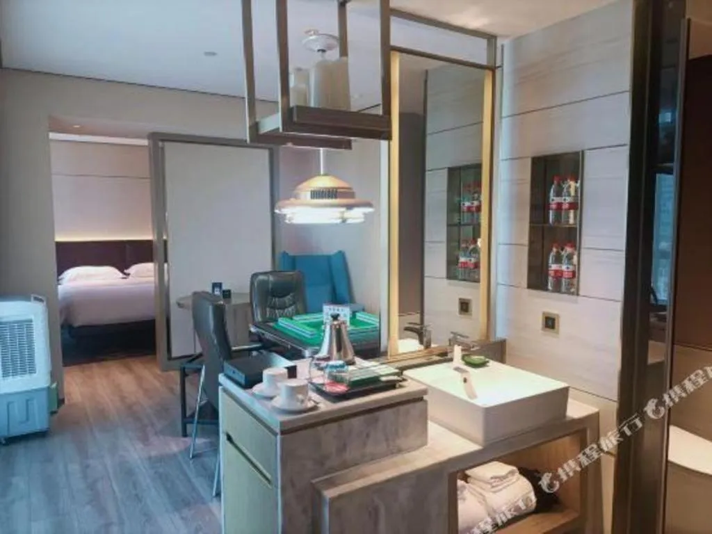 Bed in Echarm Plus Hotel Changsha High-speed Railway South Station Desiqin