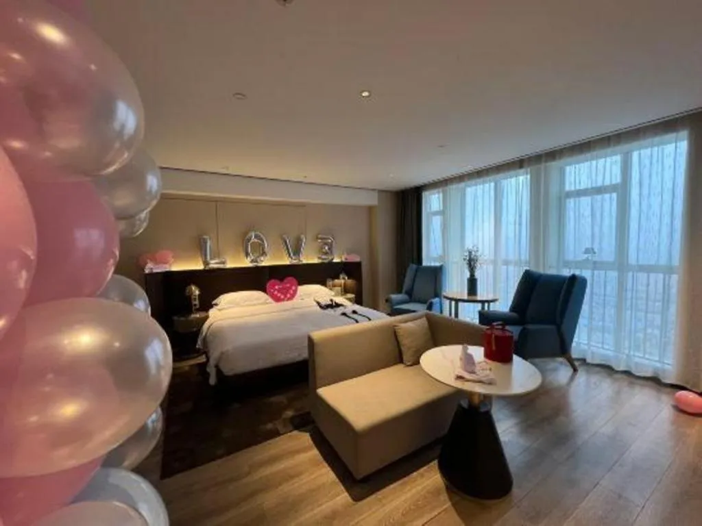 Bed in Echarm Plus Hotel Changsha High-speed Railway South Station Desiqin