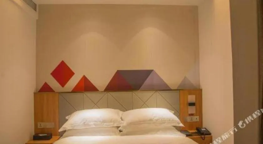 Bed in Borrman Hotel Jingzhou Jiangjin West Road Wanda Plaza Fantawild