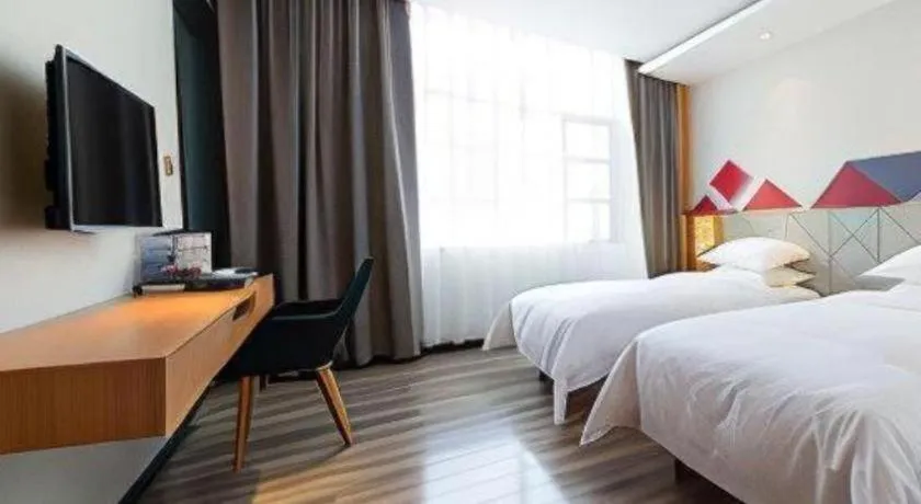 Bed in Borrman Hotel Jingzhou Jiangjin West Road Wanda Plaza Fantawild