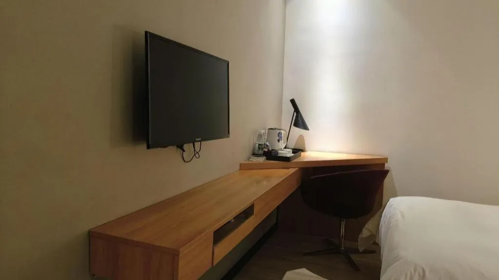 Bed in Borrman Hotel Jingzhou Jiangjin West Road Wanda Plaza Fantawild