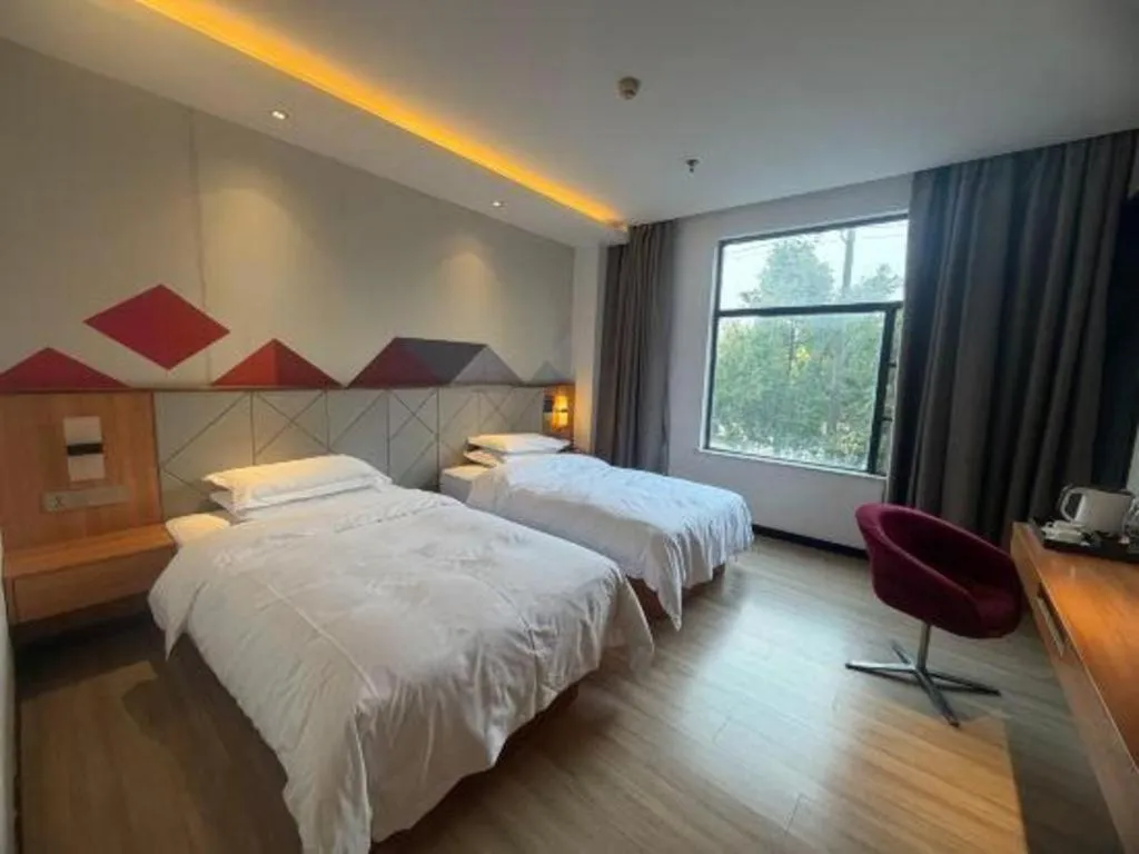 Bed in Borrman Hotel Jingzhou Jiangjin West Road Wanda Plaza Fantawild