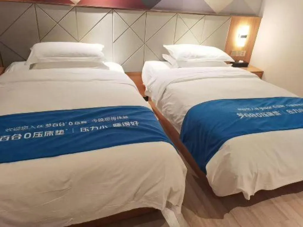 Bed in Borrman Hotel Jingzhou Jiangjin West Road Wanda Plaza Fantawild