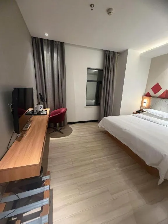 Bed in Borrman Hotel Jingzhou Jiangjin West Road Wanda Plaza Fantawild