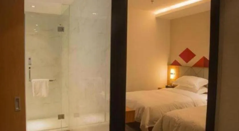 Bed in Borrman Hotel Jingzhou Jiangjin West Road Wanda Plaza Fantawild