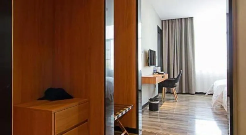 Bed in Borrman Hotel Jingzhou Jiangjin West Road Wanda Plaza Fantawild