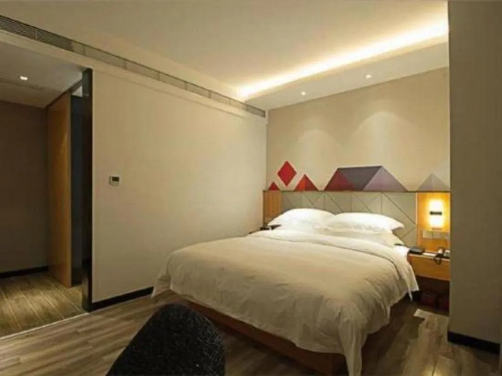 Bed in Borrman Hotel Jingzhou Jiangjin West Road Wanda Plaza Fantawild