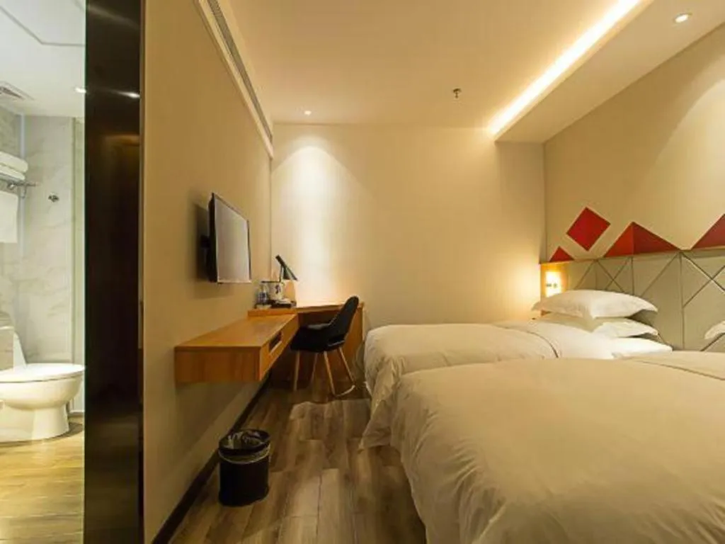 Bed in Borrman Hotel Jingzhou Jiangjin West Road Wanda Plaza Fantawild