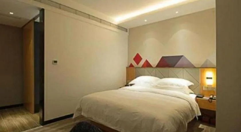 Bed in Borrman Hotel Jingzhou Jiangjin West Road Wanda Plaza Fantawild