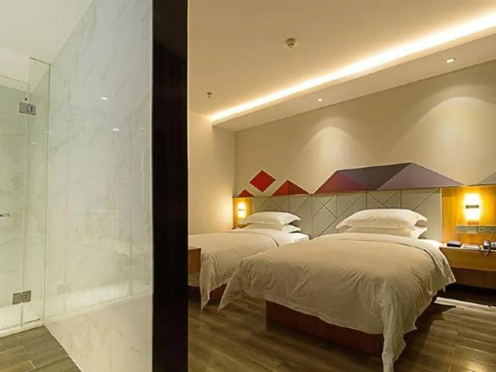Bed in Borrman Hotel Jingzhou Jiangjin West Road Wanda Plaza Fantawild