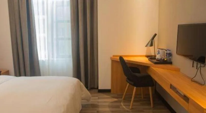 Bed in Borrman Hotel Jingzhou Jiangjin West Road Wanda Plaza Fantawild