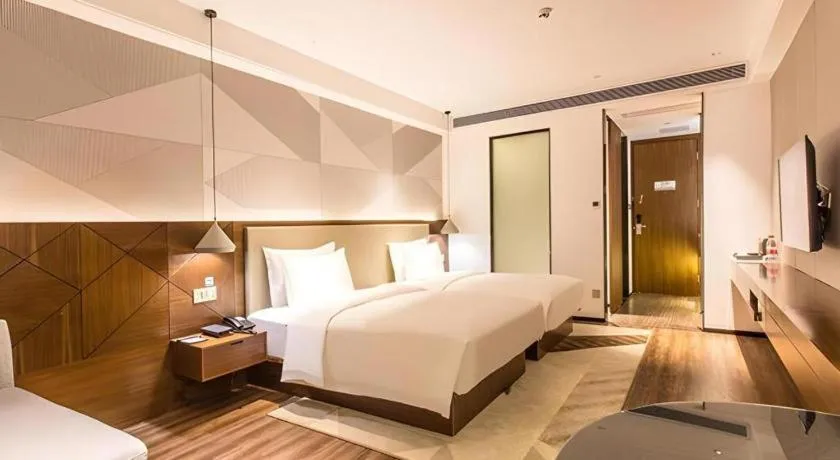 Bed in Borrman Hotel Nanning Beihu Bei Road Metro Station