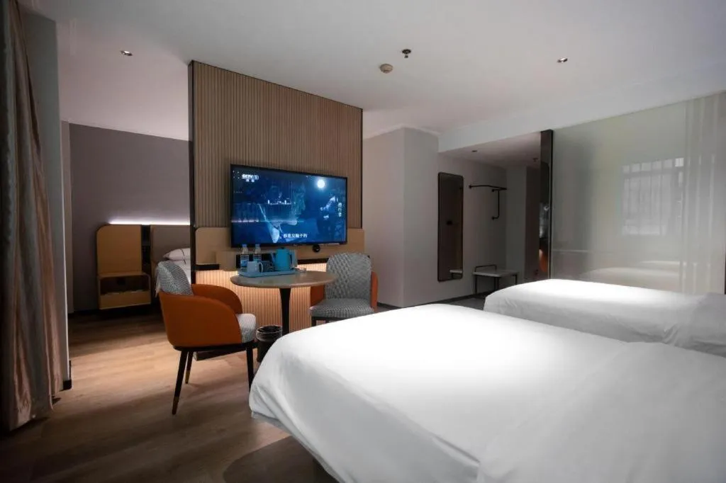 Bed in City Comfort Inn Guangzhou Dashi Metro Station Zoo Main Branch