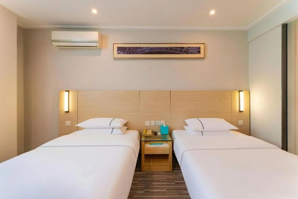 Bed in City Comfort Inn Guangzhou Dashi Metro Station Zoo Main Branch