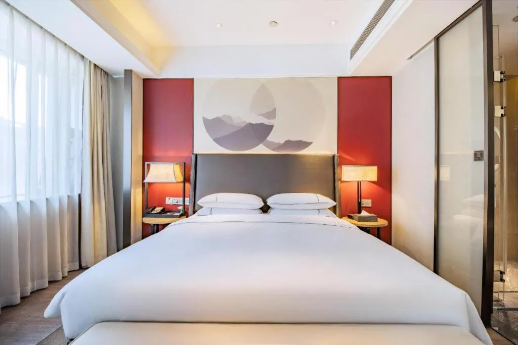 Bed in Echeng Hotel Changsha Evening News