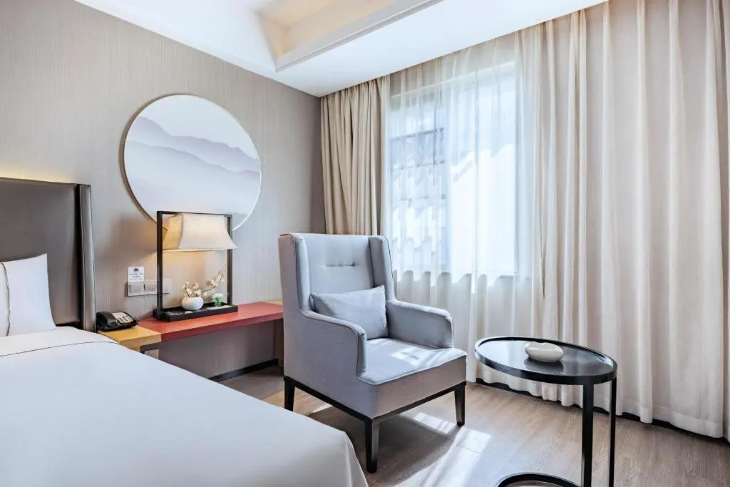 Bed in Echeng Hotel Changsha Evening News