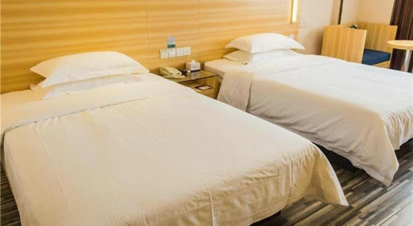 Bed in Jtour Inn Wuhan Hankou Railway East Plaza