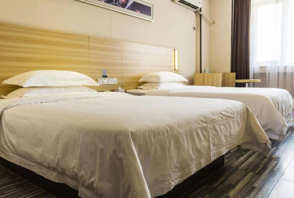 Bed in Jtour Inn Wuhan Hankou Railway East Plaza