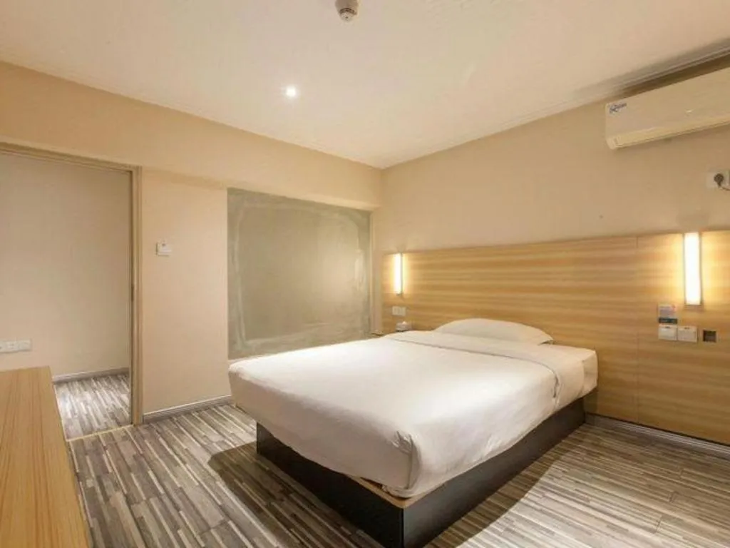 Bed in Jtour Inn Wuhan Hankou Railway East Plaza
