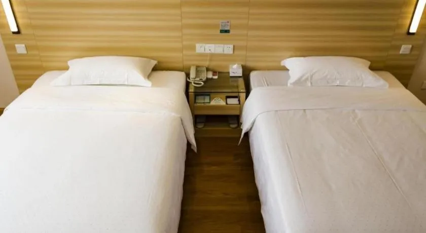 Bed in Jtour Inn Wuhan Hankou Railway East Plaza