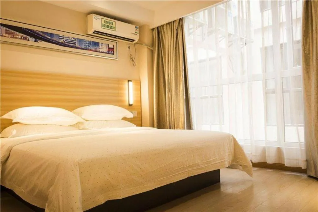 Bed in Jtour Inn Wuhan Hankou Railway East Plaza