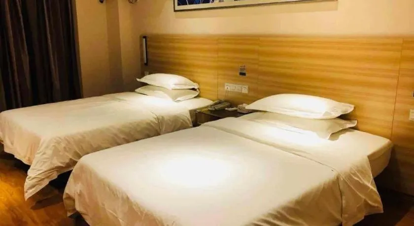 Bed in Jtour Inn Wuhan Hankou Railway East Plaza