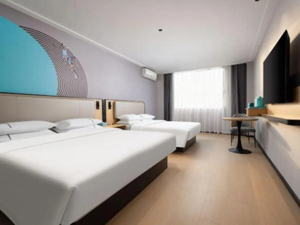 Bed in City Comfort Inn Wuhan Dongwu Avenue Light Rail Station