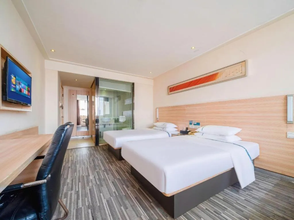 Bed in City Comfort Inn Wuhan Dongwu Avenue Light Rail Station