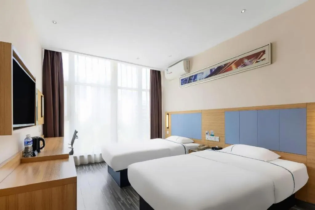 Bed in City Comfort Inn Wuhan Dongwu Avenue Light Rail Station