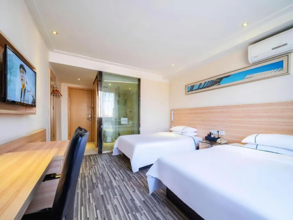 Bed in City Comfort Inn Wuhan Dongwu Avenue Light Rail Station