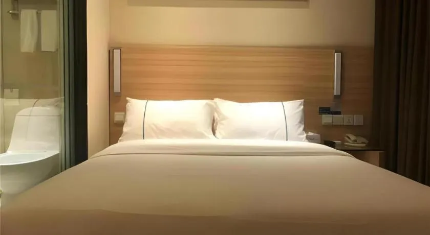 Bed in City Comfort Inn Wuhan Dongwu Avenue Light Rail Station