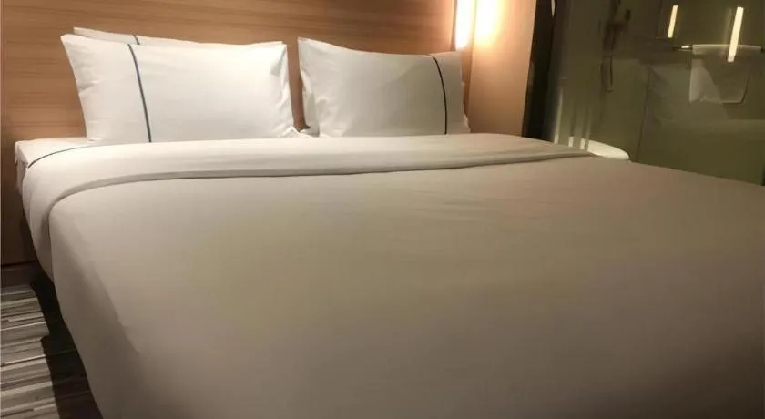 Bed in City Comfort Inn Wuhan Dongwu Avenue Light Rail Station