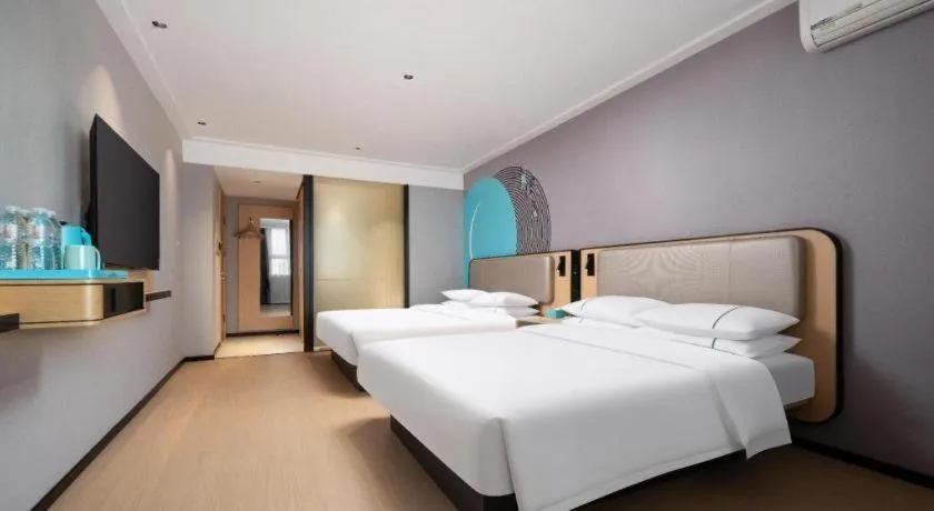 Bed in City Comfort Inn Wuhan Dongwu Avenue Light Rail Station