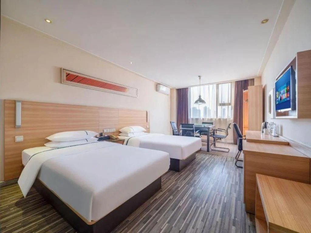 Bed in City Comfort Inn Wuhan Dongwu Avenue Light Rail Station