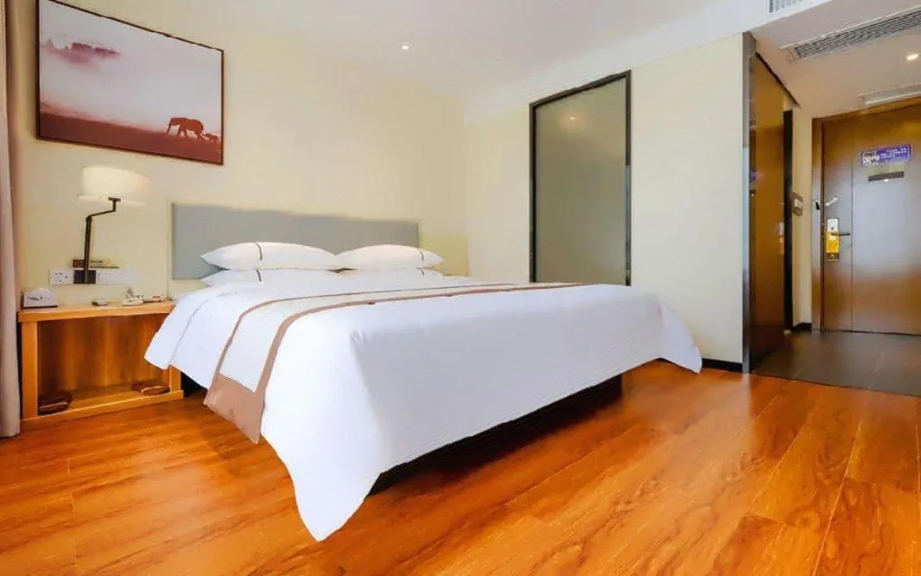 Bed in JTOUR Inn Hechi Yizhou Municipal Central Plaza